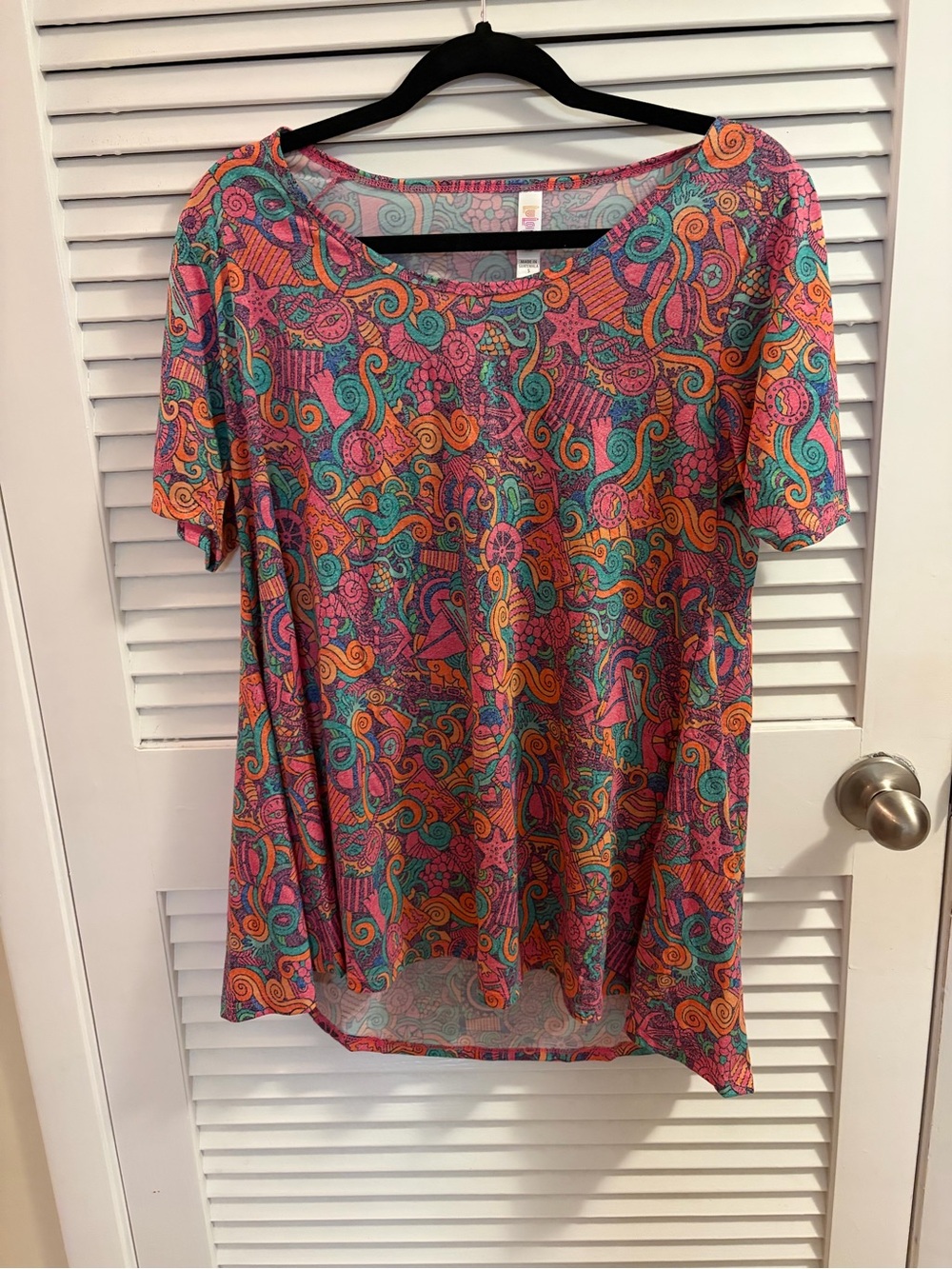 LuLaRoe Short-Sleeve Tunic in Pink Teal Orange Swirl Print